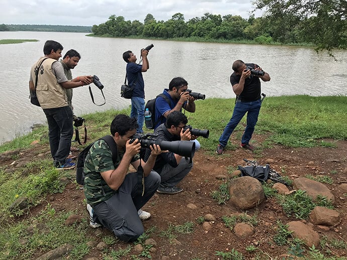 Everyone shooting in the field outing